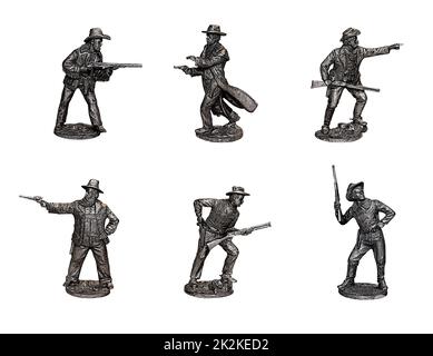 Cowboy. Gunslingers dal selvaggio West in diverse posizioni. Foto con figure in stagno. Foto Stock