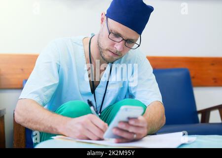 Quando non è con i pazienti, hes che fa la documentazione Foto Stock