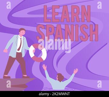 Testo che mostra ispirazione Impara lo spagnolo. Business idea traduzione Lingua in Spagna Vocabulary dialect Speech Gentleman in Suit aiutare il collega che rappresenta un lavoro di squadra di successo. Foto Stock