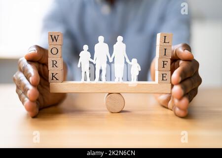 Proteggere l'equilibrio tra lavoro e vita Foto Stock