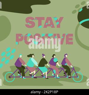 Ispirazione mostrando segno rimanere positivo. Concetto del Internet agganciano nei pensieri di uplifting sia ottimista e colleghi reali che guidano la bicicletta che rappresentano la soluzione riuscita di problema del lavoro di squadra. Foto Stock