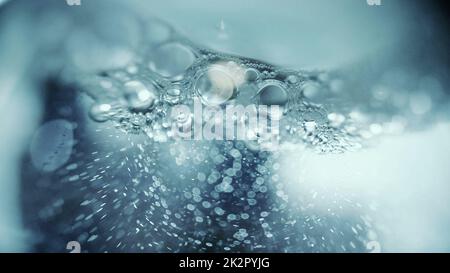 Le bolle in Una macro liquida hanno sparato profondità di campo poco profonda Foto Stock