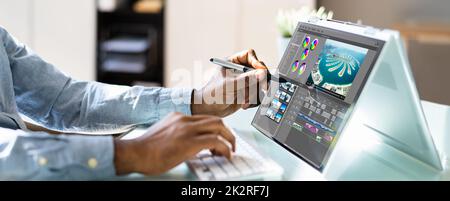 Editor video o Designer che utilizzano il software di editing Tech Foto Stock