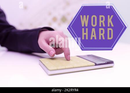 Segno che mostra lavoro duro. Lavoro di idea di affari che mette sforzo nel fare e nel completare le mansioni Foto Stock