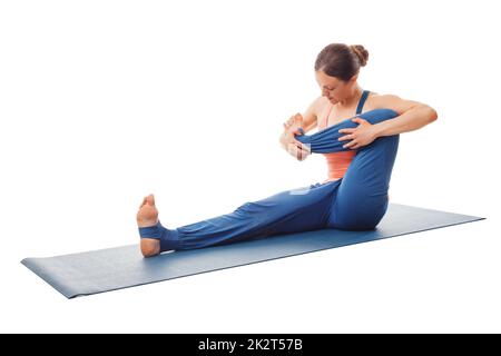 Donna che fa yoga - bambino dondolo esercizio Foto Stock