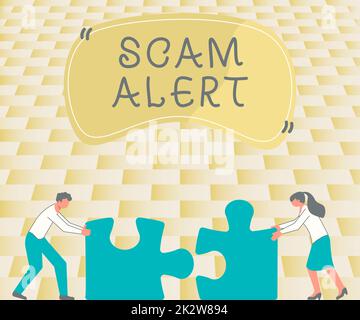 Avviso truffa didascalia concettuale. Parola per avvertire qualcuno circa lo schema o la frode notano tutti i colleghi insoliti che Conencing due pezzi Jigsaw Puzzle insieme che mostrano il lavoro di squadra. Foto Stock
