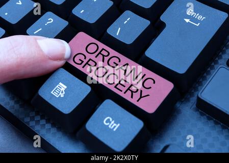 Esposizione concettuale Grocery organica. Business concept market con alimenti coltivati senza l'uso di fertilizzanti abstract typing on-line invito lettere, fissare Word Processing Program Foto Stock