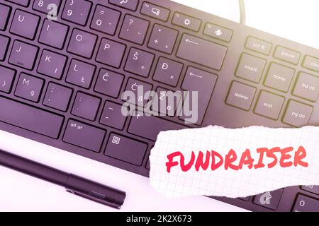 Didascalia di testo che presenta Fundraiser. Parola scritta sulla persona il cui lavoro o compito è di chiedere supporto finanziario per beneficenza computer Keyboard e Symbol.Information Medium per la comunicazione. Foto Stock