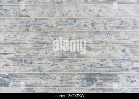 Fondo in tavole di legno ricoperte di sabbia Foto Stock