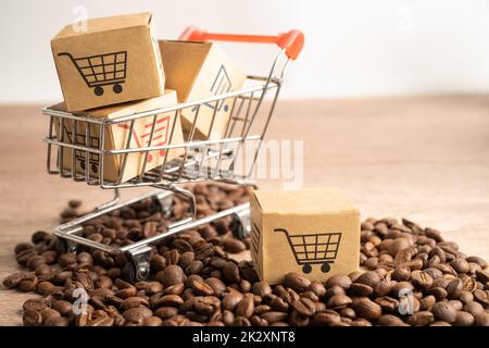 Scatola con il simbolo del carrello di shopping sui chicchi di caffè, Import Export Shopping online o servizio di consegna eCommerce negozio spedizione del prodotto, commercio, fornitore concetto. Foto Stock