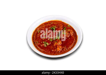 Curry di pollo rosso piccante. Vindaloo di pollo alla goa. Pollo al burro Murgh Makhani curry arrosto piatto con sugo di carne caldo e piccante Dhaba Punjab, India. North Ind Foto Stock