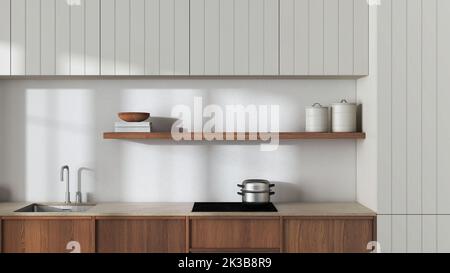 Primo piano della cucina in legno giapponese nei toni del bianco e del beige. Armadietti moderni, scaffale con decorazioni e piano cottura a induzione. Interni dal design minimalista Foto Stock