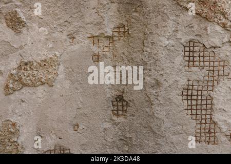 vecchio muro di pietra con crepe. Foto di alta qualità Foto Stock