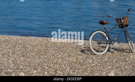 In estate, in bicicletta in acqua Foto Stock