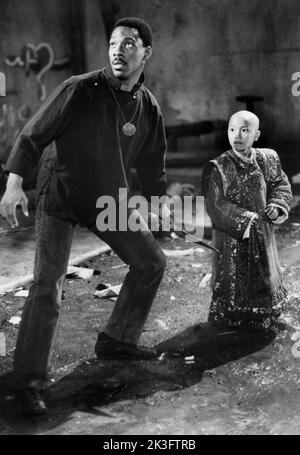 Eddie Murphy, J. L. Reate, on-set of the Film, 'The Golden Child', Paramount Pictures, 1986 Foto Stock