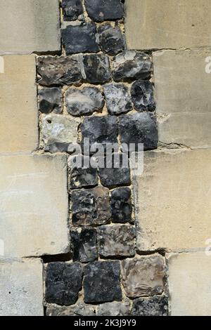 Selce e muro di pietra di Eglise Saint Martin in Rue de la Porte de Nevers, Saint Valery sur Somme, Somme, Piccardia, Hauts de France, Francia Foto Stock