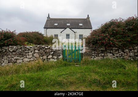 2022 settembre: Isola di canna, Ebridi interne, Scozia Un piccolo cottage Foto Stock