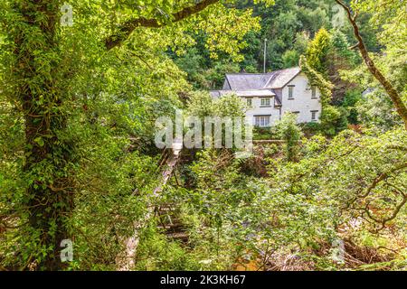 Un assaggio del villaggio di Rockford dalla via Coleridge accanto al fiume East Lyn sul Parco Nazionale di Exmoor, Rockford, Devon UK Foto Stock