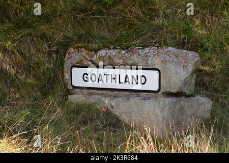 Un cartello di Goathland entrando nel villaggio nel North Yorkshire Foto Stock