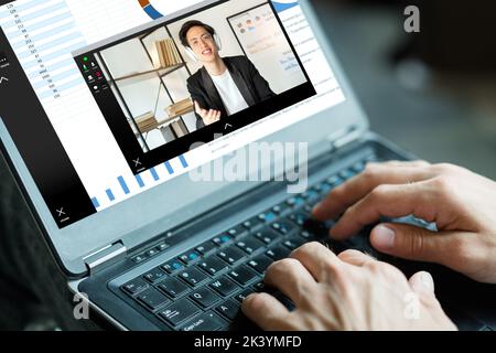 Chat video. Formazione online. Apprendimento a distanza. Webinar aziendale. Uomo che utilizza il computer portatile con grafici sullo schermo guardando allenatore asiatico in cuffie le Foto Stock