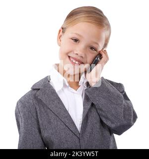 Iniziare giovane nel biz. Studio shot di un bambino che finge di essere una donna d'affari. Foto Stock