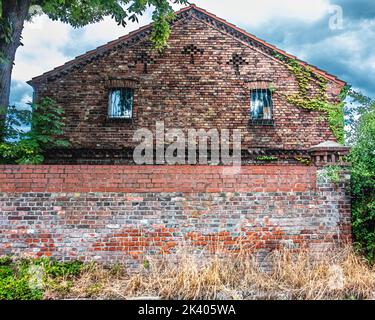 Muro del palazzo storico di Brick Stables costruito 1893–1894 da Carl sott, Lübars, Reinickendorf, Berlino Foto Stock