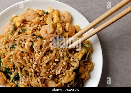 Spaghetti di riso fritti thailandesi Foto Stock