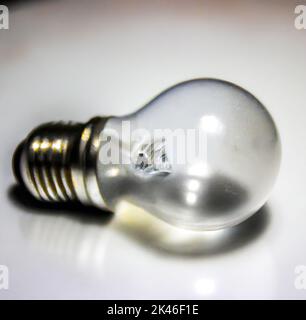 La lampadina della spia e puzzle Foto Stock