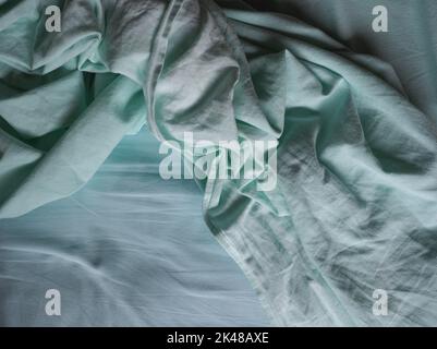 tessuto verde teal grattato utile come sfondo Foto Stock