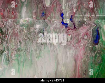 Il bellissimo sfondo astratto con una miscela di verde, rosa, blu e bianco. Foto Stock