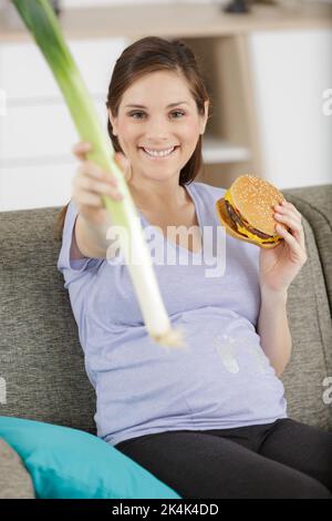 una buona gravidanza preferisce le perdite agli hamburger Foto Stock