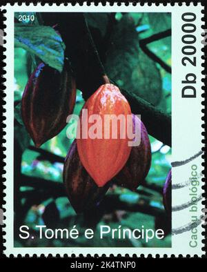Cialde di cacao sul francobollo africano Foto Stock