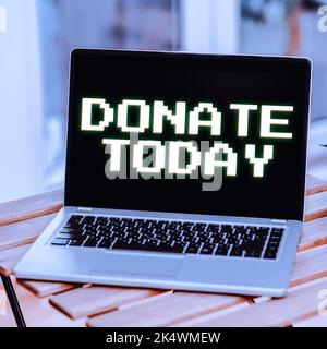 Testo che mostra ispirazione Donate oggi stesso. Concetto di affari per dare come le merci, soldi o tempo ad una persona o ad un'organizzazione Foto Stock