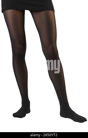 Gambe femminili sottili in collant nero stretto con effetto stringente Foto Stock