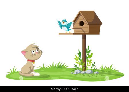 Un gatto è la visione di un canto degli uccelli su una casetta per uccelli Foto Stock