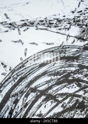 Le tracce nella neve Foto Stock