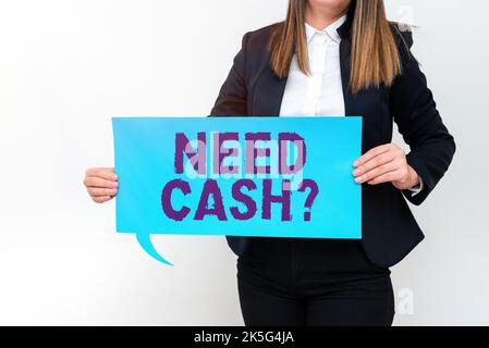 Il testo scritto a mano richiede una domanda in contanti. Concetto del Internet che chiede qualcuno se avete bisogno dei soldi supplementari o non Foto Stock