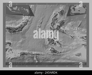 Maluku Utara, provincia dell'Indonesia. Mappa in scala di grigi con laghi e fiumi. Località e nomi delle principali città della regione. Ausiliario angolo Foto Stock