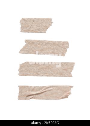 Nastro di mascheratura in carta beige di varie lunghezze Foto Stock
