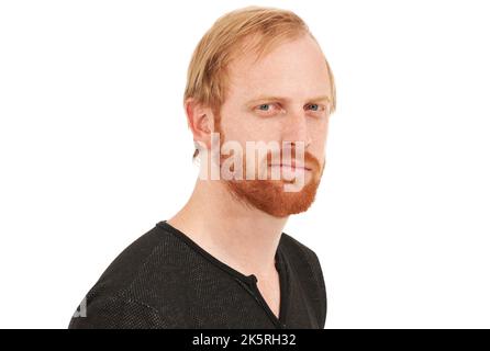 Sicuro del suo stile casual. Studio di un bell'uomo che si posa su uno sfondo bianco. Foto Stock