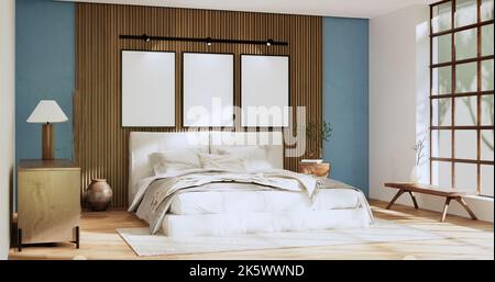 Wabi sabi letto e piante di deciartion in camera da letto giapponese blu. Rendering 3D. Foto Stock