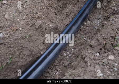 Telaio per il collegamento di tubi in trincea di terreno Foto Stock