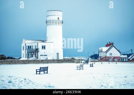 Faro di Hunstanton nella neve Foto Stock