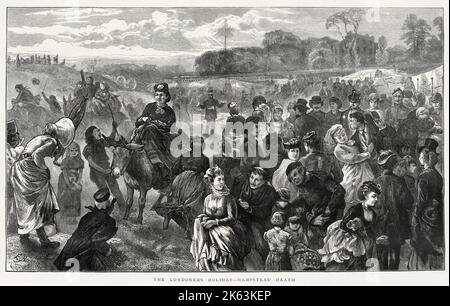 I vacanzieri si divertono ad Hampstead Heath, a nord-ovest di Londra. Foto Stock