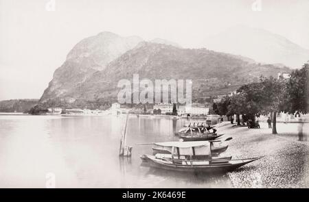 Foto d'annata del XIX secolo: Barche sul Lago di Como a Menaggio, Italia. Foto Stock