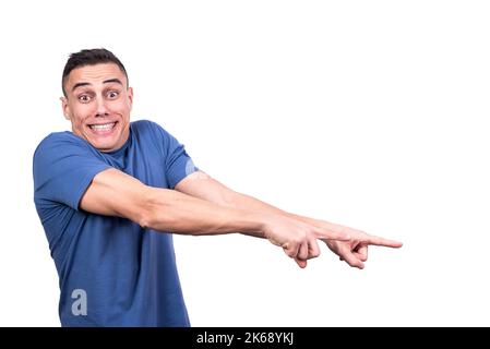 L'uomo sorride mentre indica il lato Foto Stock