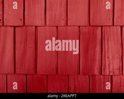 un rosso shaker casa in legno parete di scandole dipinta casa muro scandole cabina edificio sfondo capannone fattoria fienile fattoria fienile sfondo in legno Foto Stock