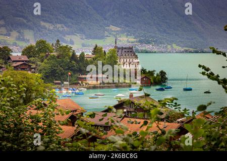 Una bella foto del castello di Seeburg sul lago Thun a Iseltwald, Svizzera Foto Stock