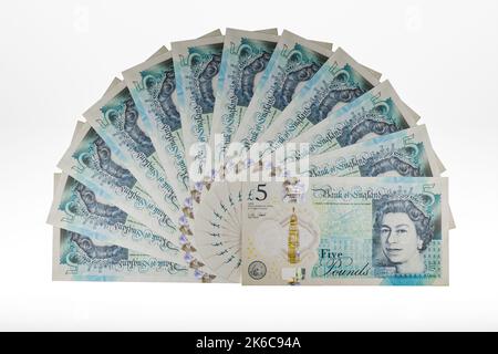 Banconote in denaro UK fan di UK Polymer £5 banconote da cinque sterline valuta britannica Foto Stock