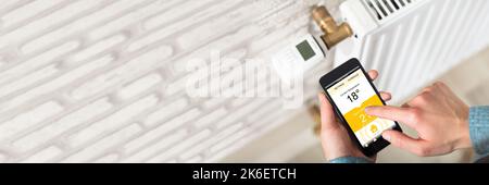 Riscaldamento del radiatore a casa. Termostato riscaldatore centrale Foto Stock